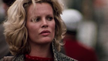 Movie still from “9½ Weeks” (1986), directed by Adrian Lyne – A person with long hair; Close Up shot, Low angle