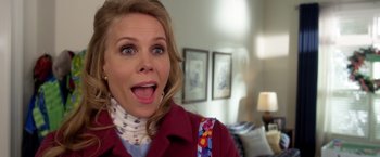 Movie still from “A Bad Moms Christmas” (2017), directed by Scott Moore – A person sticking out her tongue; Close Up shot, Over the shoulder angle