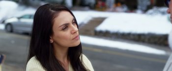 Movie still from “A Bad Moms Christmas” (2017), directed by Scott Moore – A beautiful young lady with long dark brown hair; Close Up shot, Over the shoulder angle