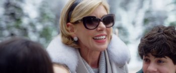 Movie still from “A Bad Moms Christmas” (2017), directed by Scott Moore – A person wearing sunglasses; Close Up shot, Over the shoulder angle