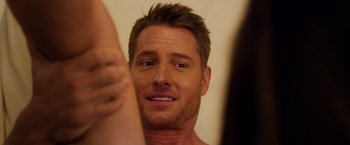 Movie still from “A Bad Moms Christmas” (2017), directed by Scott Moore – A man's face and his arm; Close Up shot, Over the shoulder angle