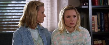 Movie still from “A Bad Moms Christmas” (2017), directed by Scott Moore – Two women sitting next to each other on a couch; Close Up shot, Over the shoulder angle