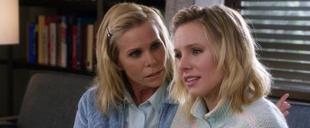 Movie still from “A Bad Moms Christmas” (2017), directed by Scott Moore – A woman and a girl standing next to each other; Close Up shot, Over the shoulder angle