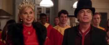 Movie still from “A Bad Moms Christmas” (2017), directed by Scott Moore – A group of people standing in a room; Close Up shot, Over the shoulder angle