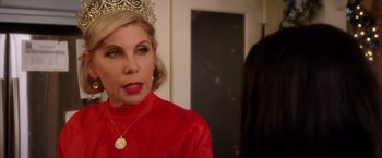 Movie still from “A Bad Moms Christmas” (2017), directed by Scott Moore – A woman wearing a tiara and a red dress; Close Up shot, Over the shoulder angle