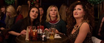 Movie still from “A Bad Moms Christmas” (2017), directed by Scott Moore – A group of women sitting at a table with drinks; Close Up shot, Over the shoulder angle