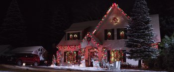 Movie still from “A Bad Moms Christmas” (2017), directed by Scott Moore – A house decorated for the christmas holidays with lights; Extreme Wide shot, High angle
