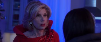 Movie still from “A Bad Moms Christmas” (2017), directed by Scott Moore – A person wearing a red dress; Close Up shot, Over the shoulder angle