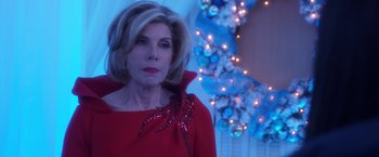 Movie still from “A Bad Moms Christmas” (2017), directed by Scott Moore – A person wearing a red dress; Close Up shot, Over the shoulder angle