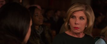 Movie still from “A Bad Moms Christmas” (2017), directed by Scott Moore – A woman with blonde hair is looking at the camera; Close Up shot, Over the shoulder angle