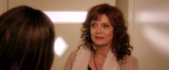 Movie still from “A Bad Moms Christmas” (2017), directed by Scott Moore – A person looking at a mirror; Close Up shot, Over the shoulder angle