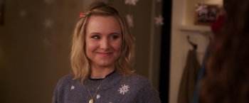 Movie still from “A Bad Moms Christmas” (2017), directed by Scott Moore – A person wearing a sweater; Close Up shot, Over the shoulder angle