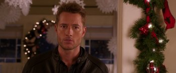 Movie still from “A Bad Moms Christmas” (2017), directed by Scott Moore – A person wearing a leather jacket; Close Up shot, Over the shoulder angle