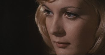 Movie still from “A Bay of Blood” (1971), directed by Mario Bava – A woman's eyes and face; Close Up shot, High angle