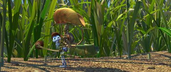 Movie still from “A Bug's Life” (1998), directed by John Lasseter – An animated character in a field of corn; Extreme Wide shot, High angle