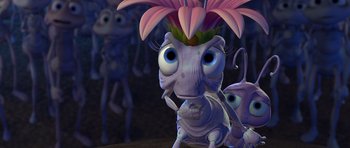 Movie still from “A Bug's Life” (1998), directed by John Lasseter – An animal with a flower in it's head; Extreme Close Up shot, High angle