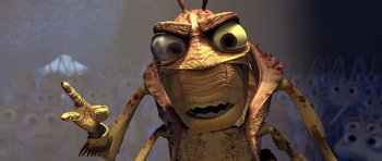 Movie still from “A Bug's Life” (1998), directed by John Lasseter – An insect with a face; Extreme Close Up shot, High angle
