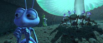 Movie still from “A Bug's Life” (1998), directed by John Lasseter – An animated scene of an ant and other animals; Extreme Wide shot, High angle