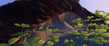 Movie still from “A Bug's Life” (1998), directed by John Lasseter – View of some plants in the desert; Extreme Wide shot, High angle