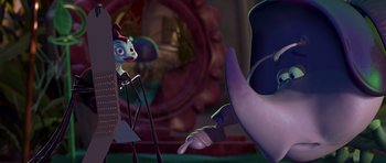 Movie still from “A Bug's Life” (1998), directed by John Lasseter – A person holding something in their hand; Medium shot, Low angle