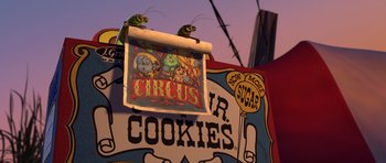 Movie still from “A Bug's Life” (1998), directed by John Lasseter – A sign that is hanging from a building; Wide shot, Low angle