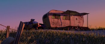 Movie still from “A Bug's Life” (1998), directed by John Lasseter – An old trailer sits in the middle of a grassy field; Extreme Wide shot, Low angle