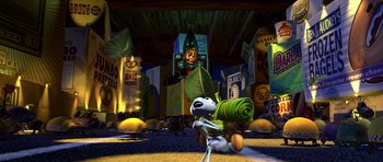 Movie still from “A Bug's Life” (1998), directed by John Lasseter – An animated scene of a mouse with a leaf on his head; Extreme Wide shot, High angle