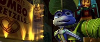 Movie still from “A Bug's Life” (1998), directed by John Lasseter – A cartoon character with a leaf on his head; Extreme Close Up shot, Low angle