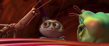 Movie still from “A Bug's Life” (1998), directed by John Lasseter – An animated bug with red eyes looking at the camera; Extreme Close Up shot, Over the shoulder angle