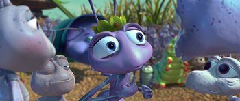 Movie still from “A Bug's Life” (1998), directed by John Lasseter – An animated bug with a flower on its head; Extreme Close Up shot, High angle