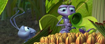 Movie still from “A Bug's Life” (1998), directed by John Lasseter – An animated character holding an object in his mouth; Extreme Close Up shot, Over the shoulder angle