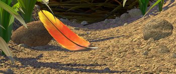 Movie still from “A Bug's Life” (1998), directed by John Lasseter – An image of a bird that is laying on the ground; Wide shot, Overhead angle