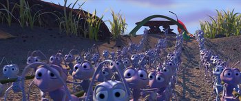 Movie still from “A Bug's Life” (1998), directed by John Lasseter – A bunch of purple ants in a field; Extreme Wide shot, High angle