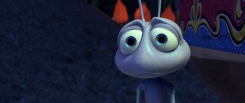 Movie still from “A Bug's Life” (1998), directed by John Lasseter – An animated bug looking up at the sky; Extreme Close Up shot, High angle
