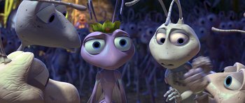 Movie still from “A Bug's Life” (1998), directed by John Lasseter – A couple of bugs that are standing in the dirt; Close Up shot, High angle