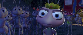 Movie still from “A Bug's Life” (1998), directed by John Lasseter – An animated picture of an ant with a flower on its head; Extreme Close Up shot, High angle