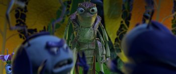Movie still from “A Bug's Life” (1998), directed by John Lasseter – A green bug with blue eyes; Extreme Close Up shot, Over the shoulder angle