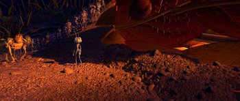 Movie still from “A Bug's Life” (1998), directed by John Lasseter – An ant standing in the dirt next to a leaf; Extreme Wide shot, High angle