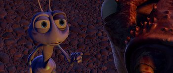 Movie still from “A Bug's Life” (1998), directed by John Lasseter – An image of an animated character in a field; Extreme Close Up shot, High angle
