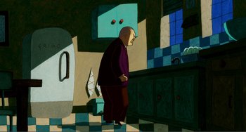Movie still from “A Cat in Paris” (2010), directed by Alain Gagnol – An old man standing in a kitchen next to a sink; Wide shot, High angle