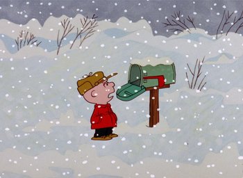 Movie still from “A Charlie Brown Christmas” (1965), directed by Bill Melendez – Charlie brown looking at a mailbox in the snow; Extreme Wide shot, High angle