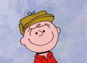 Movie still from “A Charlie Brown Christmas” (1965), directed by Bill Melendez – A drawing of charlie brown wearing a hat; Close Up shot, Low angle