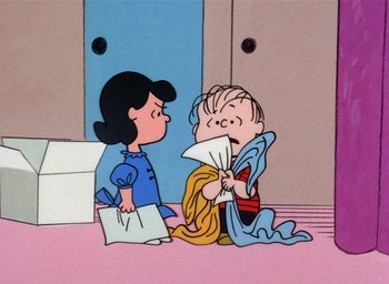 Movie still from “A Charlie Brown Christmas” (1965), directed by Bill Melendez – A charlie brown and a lucy cartoon character; Extreme Wide shot, High angle