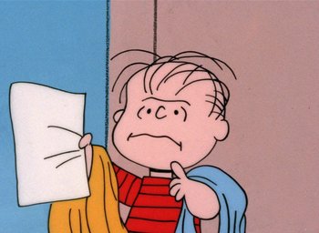 Movie still from “A Charlie Brown Christmas” (1965), directed by Bill Melendez – A drawing of a boy holding a piece of paper; Close Up shot, High angle