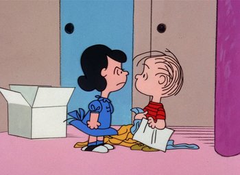 Movie still from “A Charlie Brown Christmas” (1965), directed by Bill Melendez – A couple of people that are standing up in a room; Medium shot, High angle