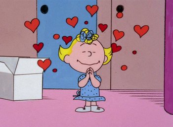 Movie still from “A Charlie Brown Christmas” (1965), directed by Bill Melendez – A cartoon of a little girl with her hands in her mouth; Medium shot, High angle