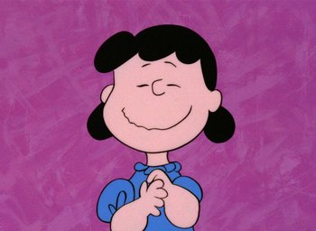 Movie still from “A Charlie Brown Christmas” (1965), directed by Bill Melendez – A drawing of a cartoon character with her hands clasped together; Close Up shot, High angle