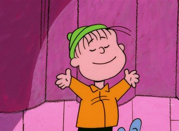 Movie still from “A Charlie Brown Christmas” (1965), directed by Bill Melendez – A charlie brown cartoon character with his arms outstreched; Medium shot, Low angle