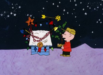 Movie still from “A Charlie Brown Christmas” (1965), directed by Bill Melendez – A charlie brown christmas scene with a charlie brown tree; Extreme Wide shot, Overhead angle