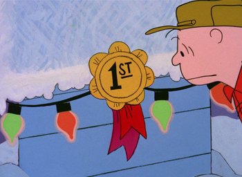 Movie still from “A Charlie Brown Christmas” (1965), directed by Bill Melendez – A medal with the number 1 st on it; Close Up shot, Low angle